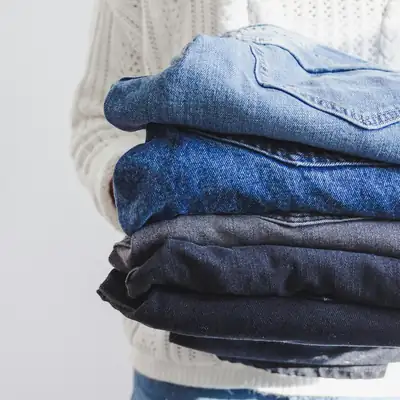 Stack of folded cotton denim garments
